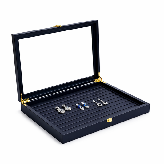 Boîte à colliers noire avec couvercle transparent et surface rainurée